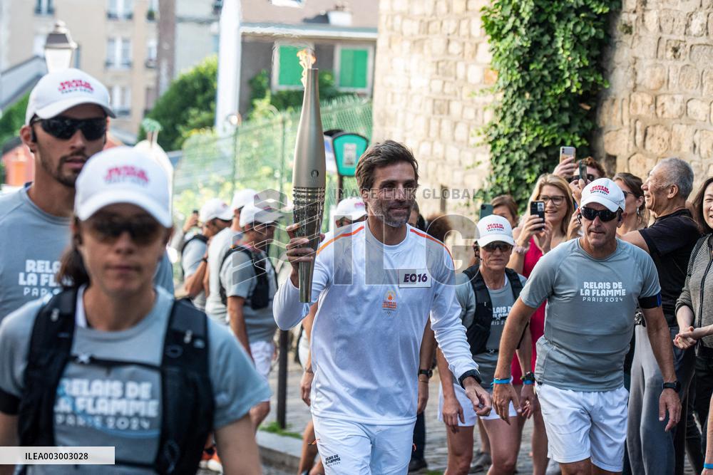 Paris 2024 - Arnaud Clement Carries The Olympic Torch