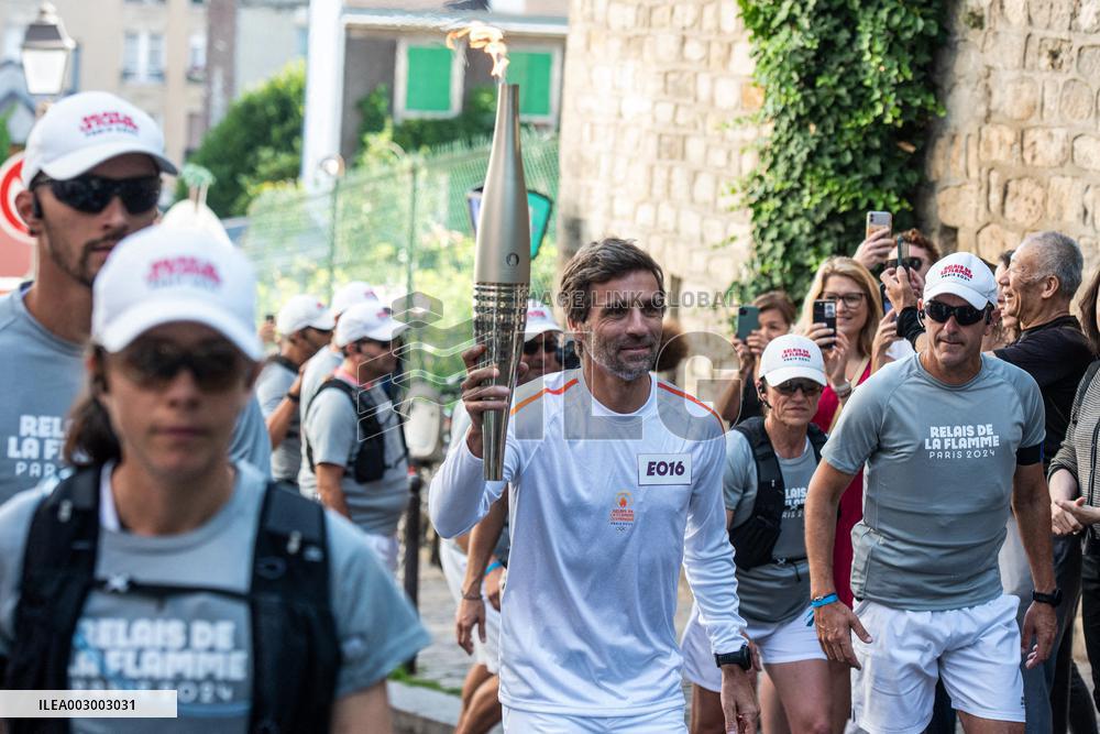 Paris 2024 - Arnaud Clement Carries The Olympic Torch
