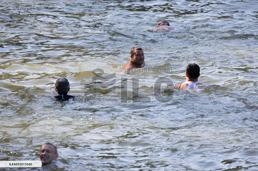 People Swimming In The Seine River - Paris