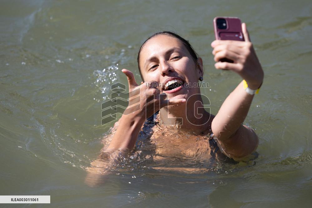 People Swimming In The Seine River - Paris