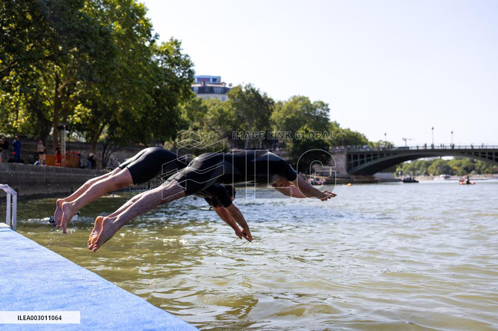 People Swimming In The Seine River - Paris