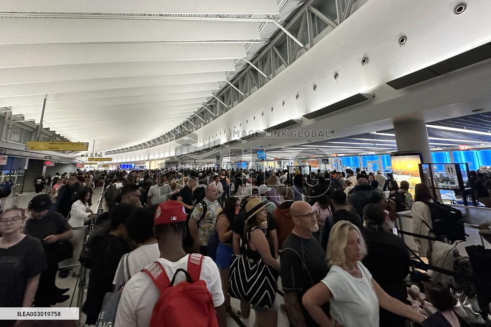 IT Outage Brings Airport Chaos - JFK