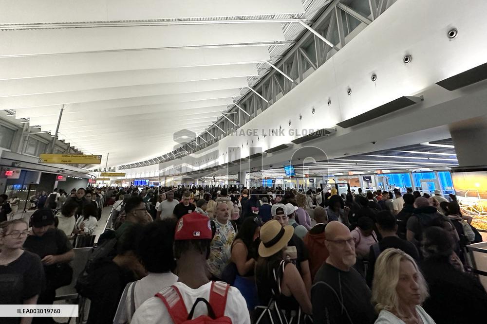 IT Outage Brings Airport Chaos - JFK