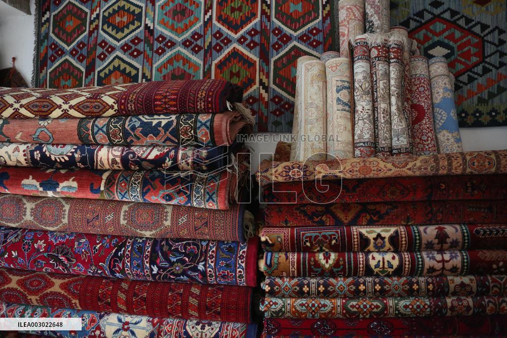 AFGHANISTAN-KABUL-CARPET SELLER