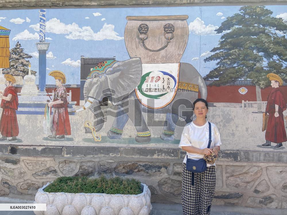 Tourists Visit Wuliang Temple in Hohhot