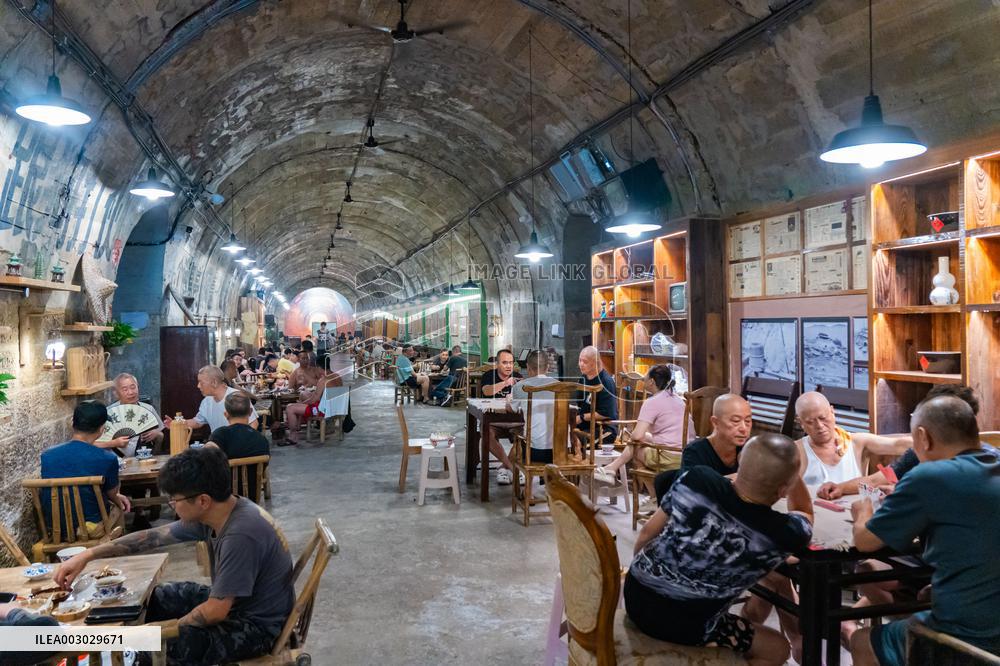 Residents at A Bomb Shelter to Cool Off in Chongqing