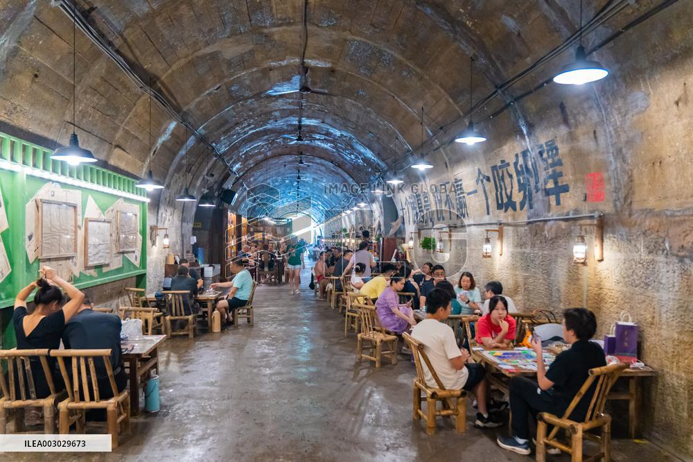 Residents at A Bomb Shelter to Cool Off in Chongqing