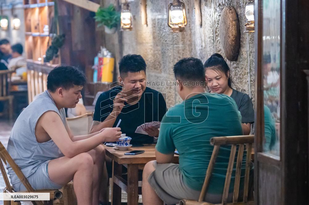 Residents at A Bomb Shelter to Cool Off in Chongqing