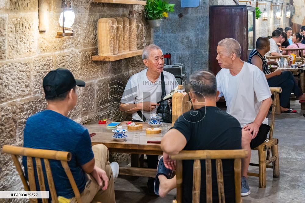 Residents at A Bomb Shelter to Cool Off in Chongqing