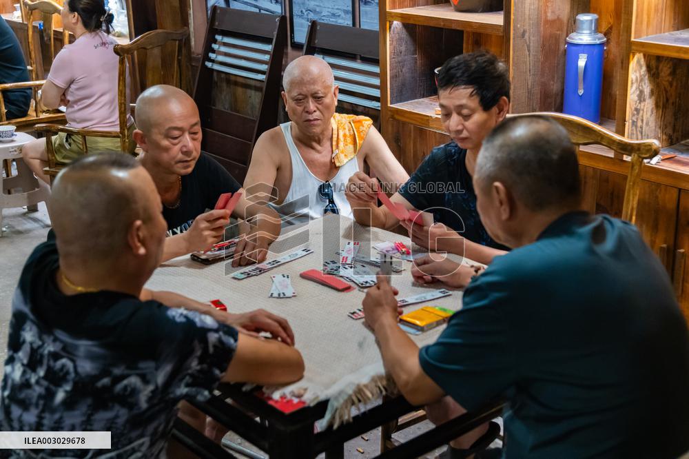 Residents at A Bomb Shelter to Cool Off in Chongqing
