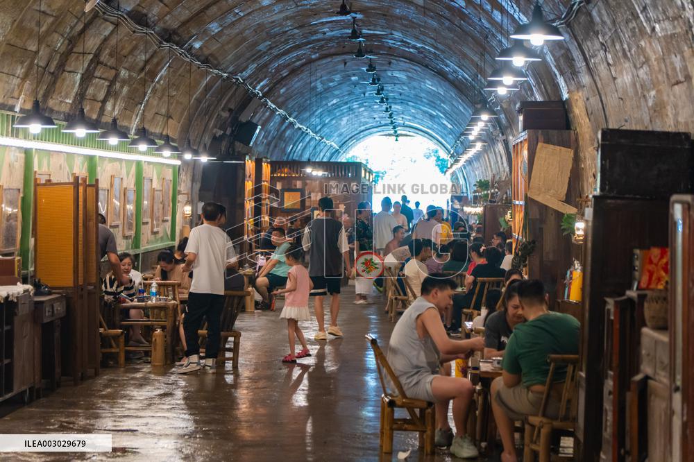 Residents at A Bomb Shelter to Cool Off in Chongqing