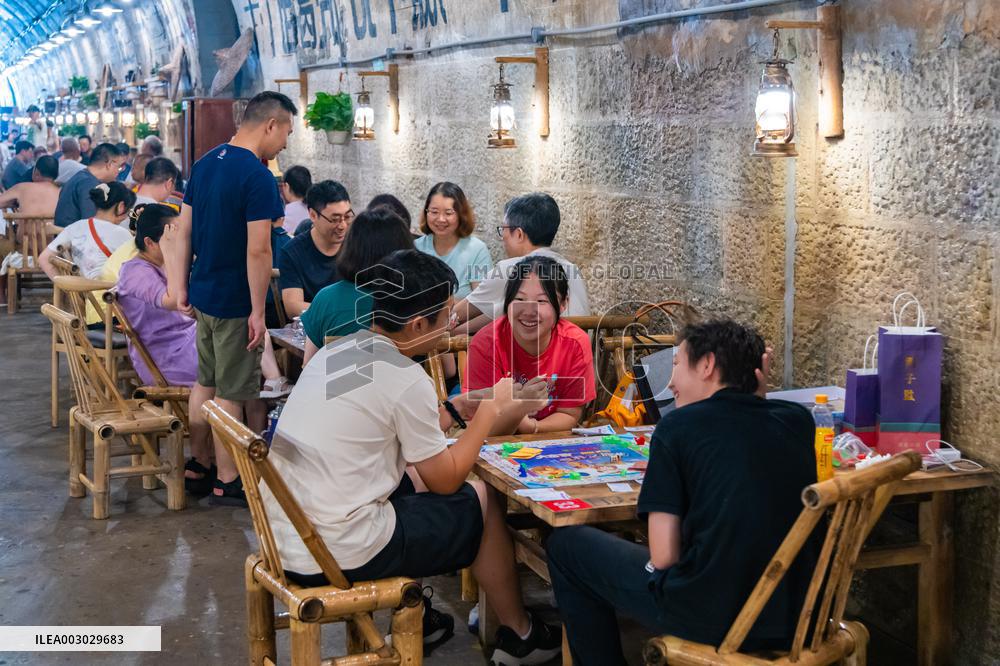 Residents at A Bomb Shelter to Cool Off in Chongqing