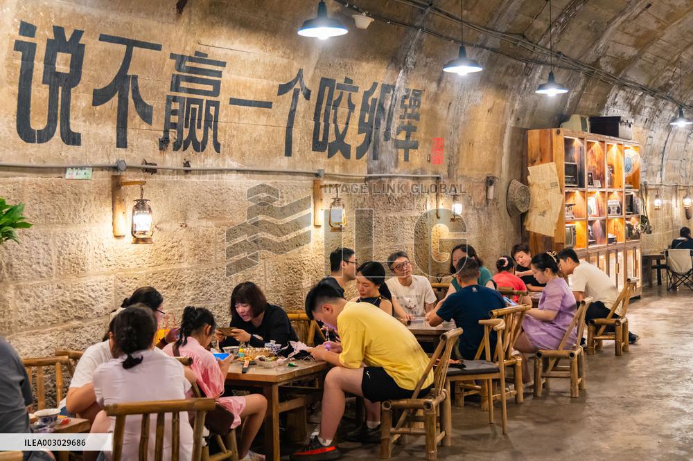 Residents at A Bomb Shelter to Cool Off in Chongqing