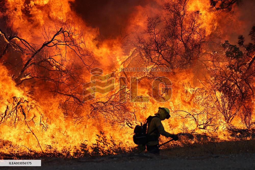 Fires Rage Across US West