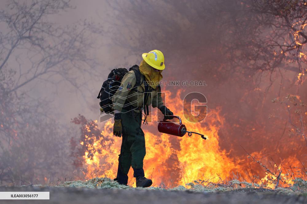 Fires Rage Across US West