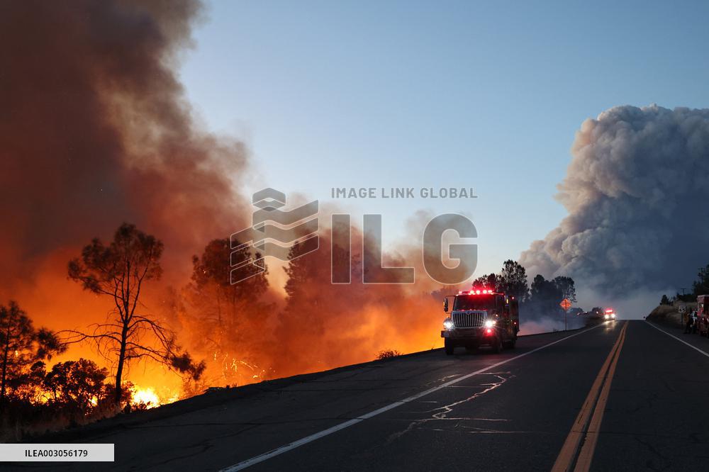Fires Rage Across US West