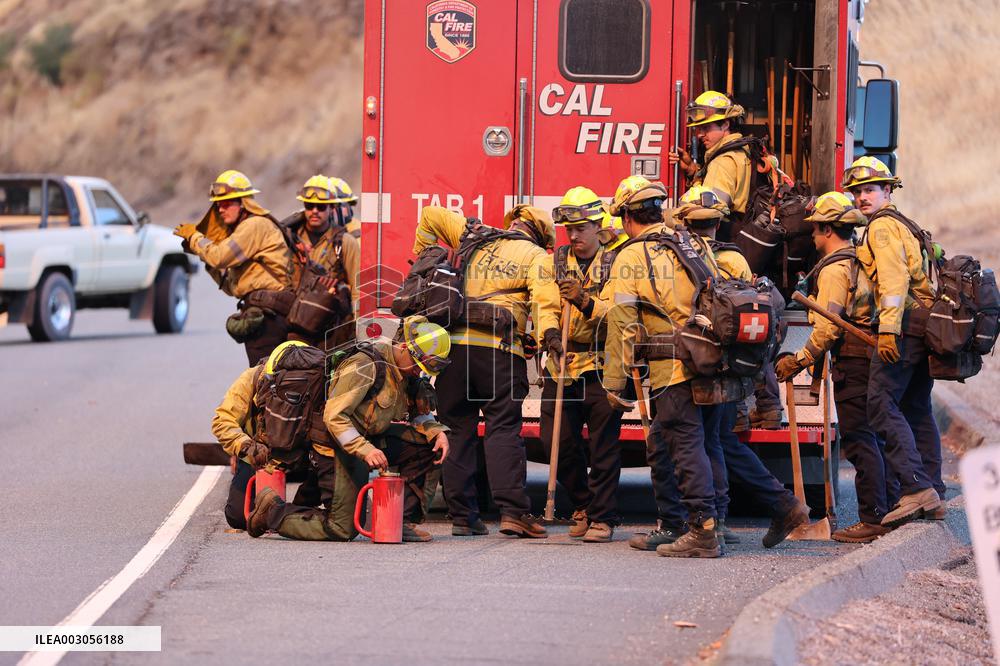 Fires Rage Across US West