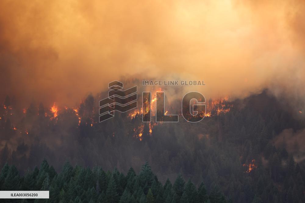 Fires Rage Across US West