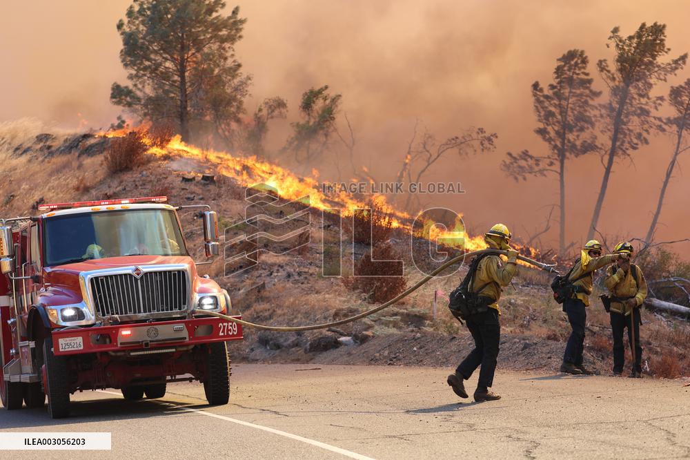 Fires Rage Across US West