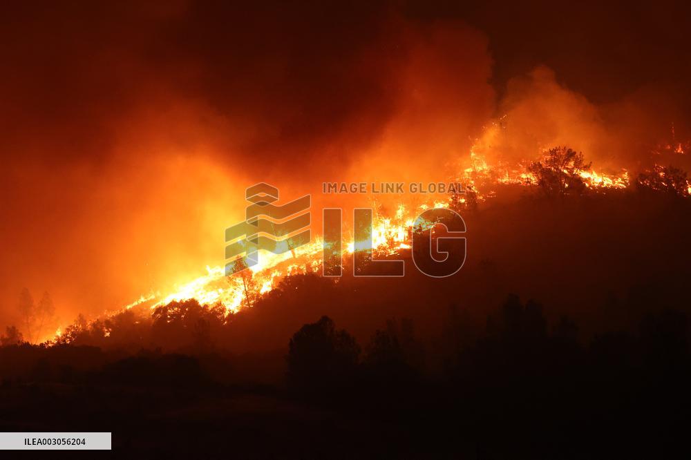 Fires Rage Across US West