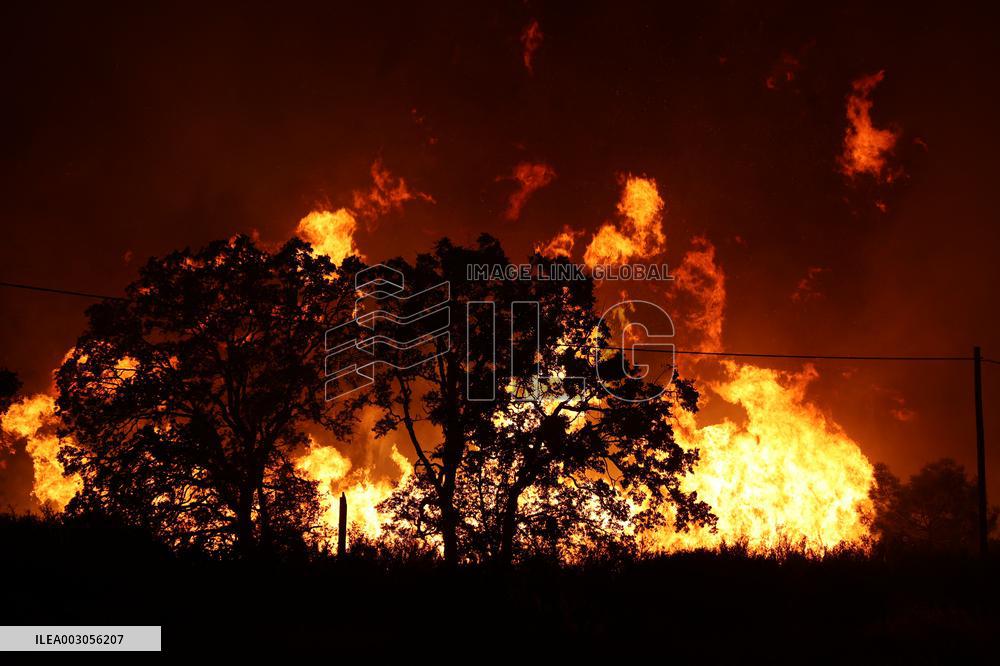 Fires Rage Across US West