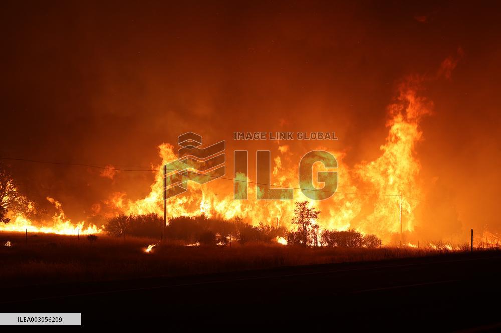 Fires Rage Across US West