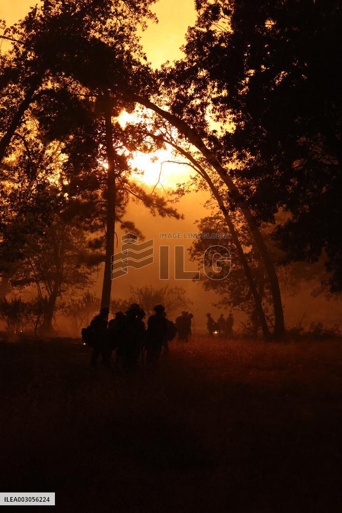 Fires Rage Across US West