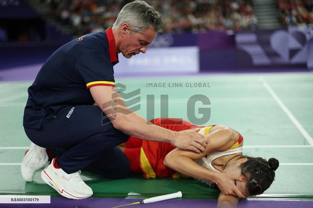 Paris 2024 - Carolina Marin of Spain suffers an injury during badminton women's singles