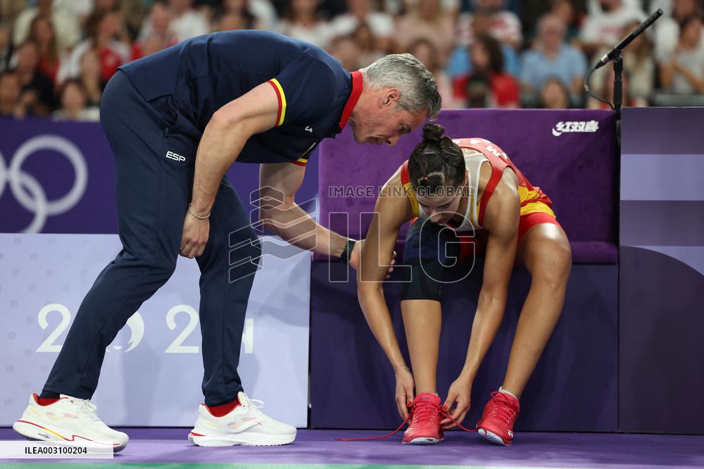 Paris 2024 - Carolina Marin of Spain suffers an injury during badminton women's singles