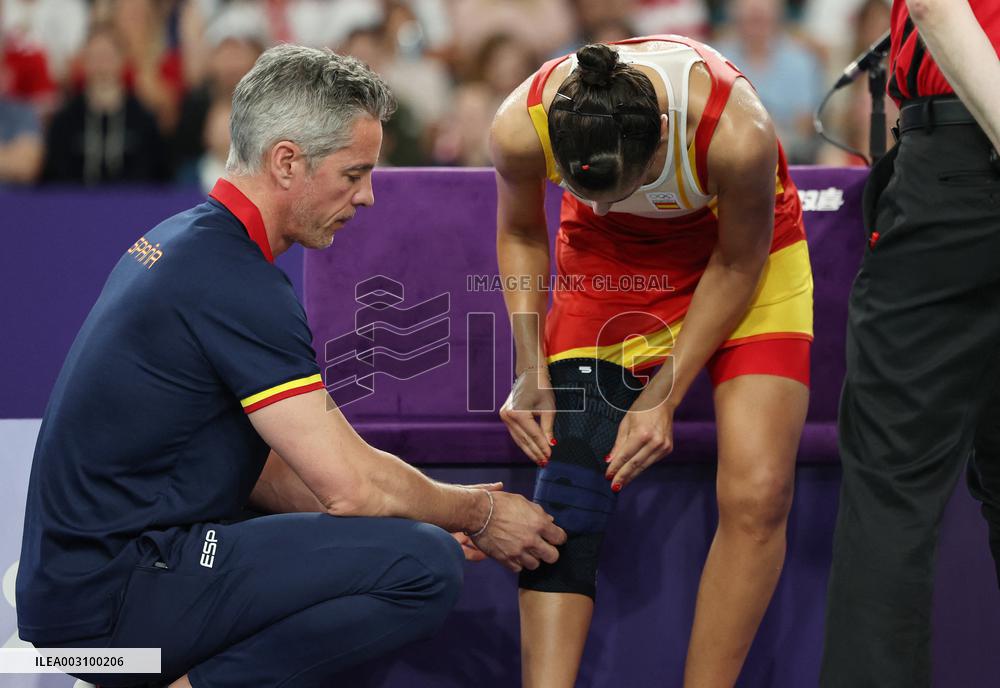 Paris 2024 - Carolina Marin of Spain suffers an injury during badminton women's singles