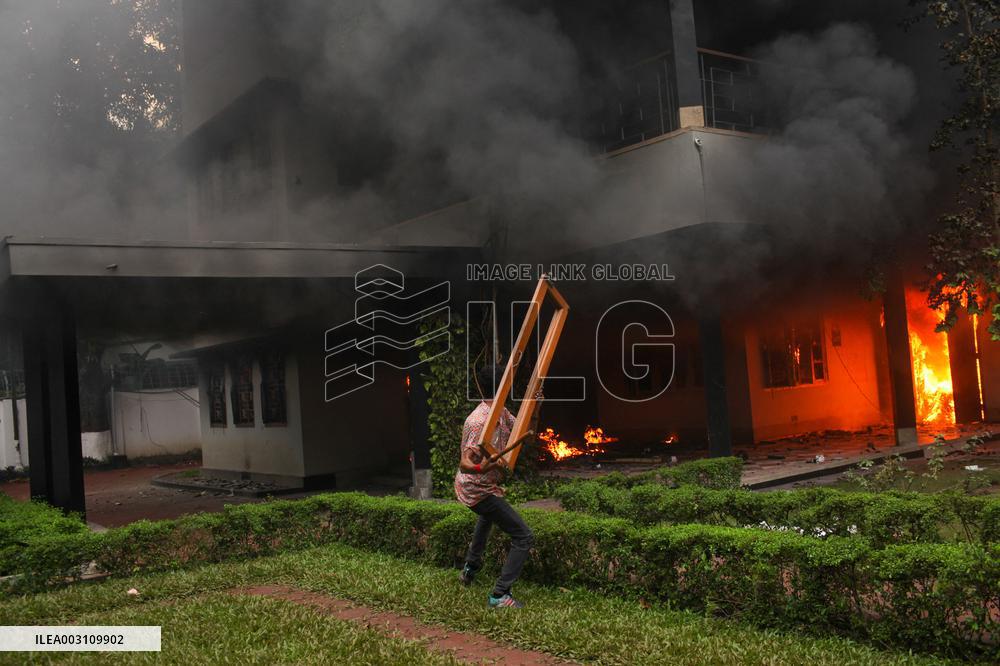 PM Sheikh Hasina Flees Country As Protesters Storm Palace - Dhaka