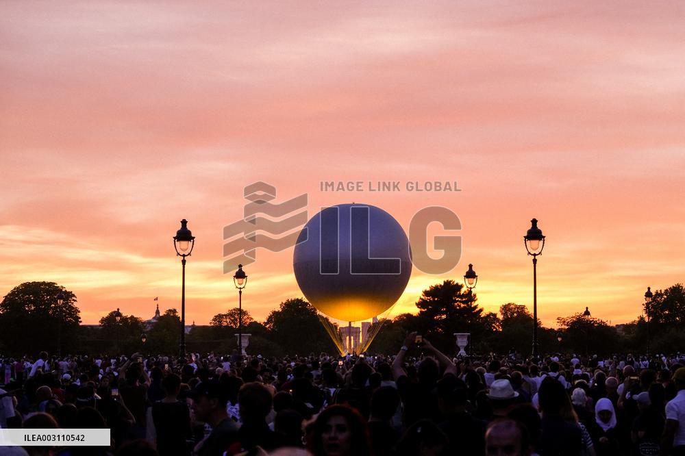 Paris 2024 - Olympic Cauldron Draws Massive Crowds