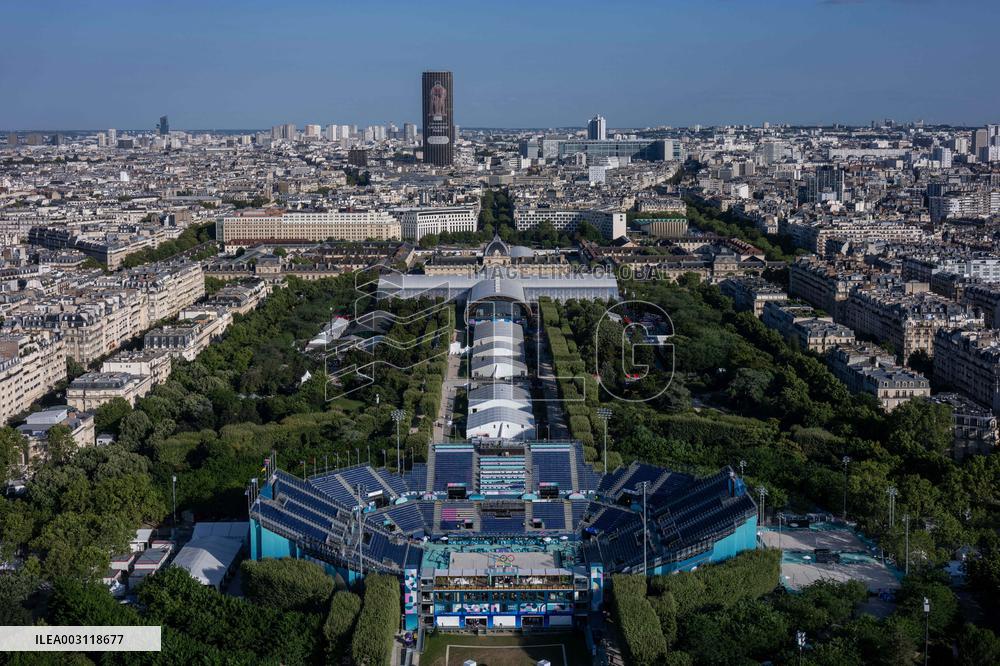 Paris 2024 - Giant Image Of Superstar Leon Marchand Diplayed On The Tour Montparnasse