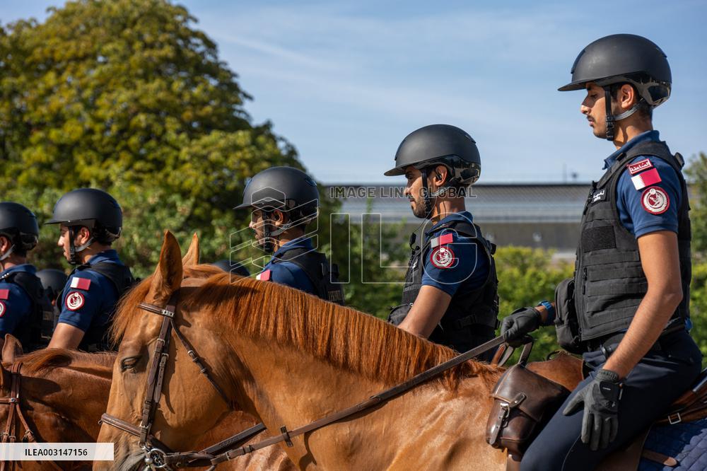 Paris 2024 - Mounted Policemen Pose Next To The Olympic Cauldron