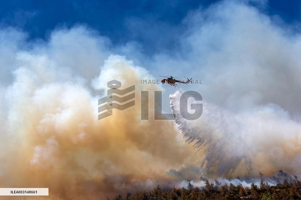 Thousands Evacuated As Wildfires Approach Athens