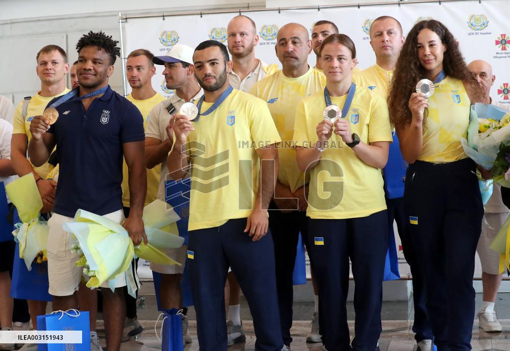 Team Ukraine athletes come home from Paris 2024 Olympics