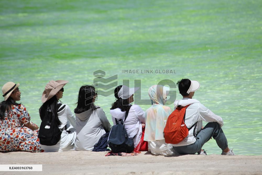 Tourists Visit Qarhan Salt Lake in Haixi