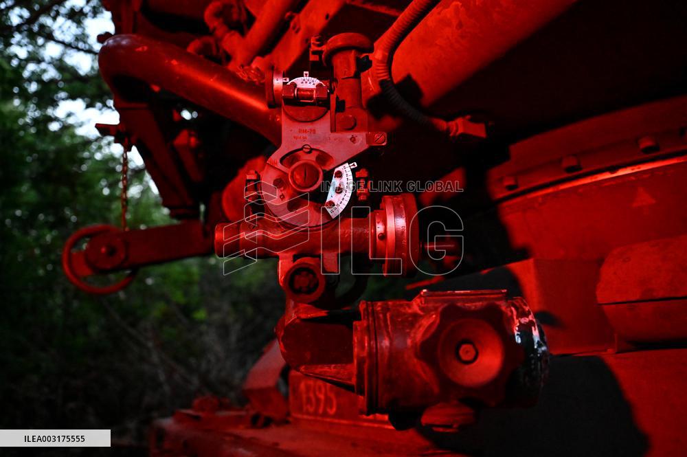 Ukrainian artillerymen fire multiple rocket launcher in Donetsk region