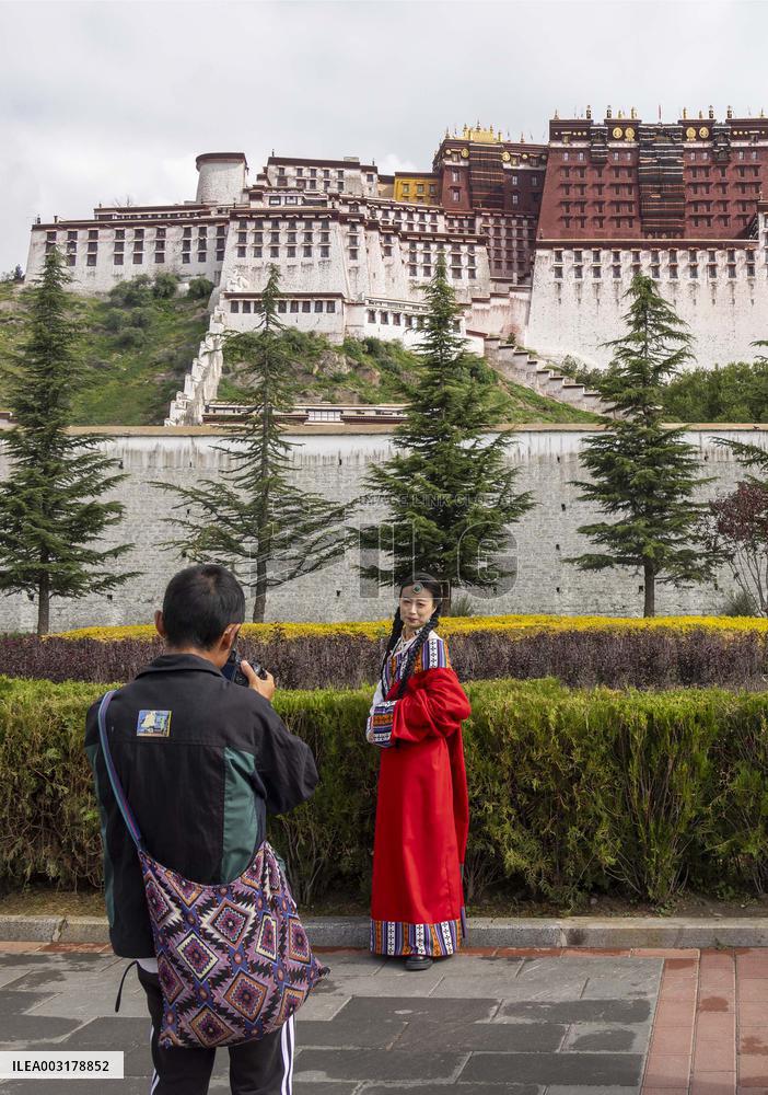 Tourists Visit The Potala Palace in Lhasa