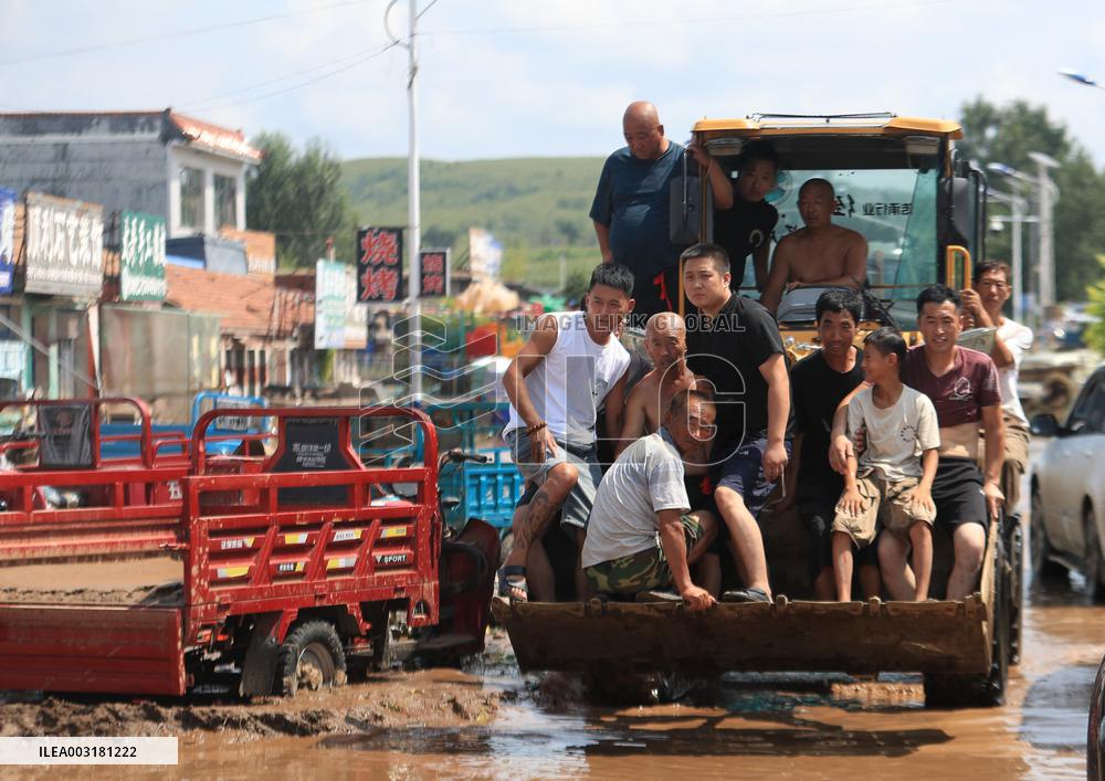 Disastrous Rainstorms Drench Provinces Across China