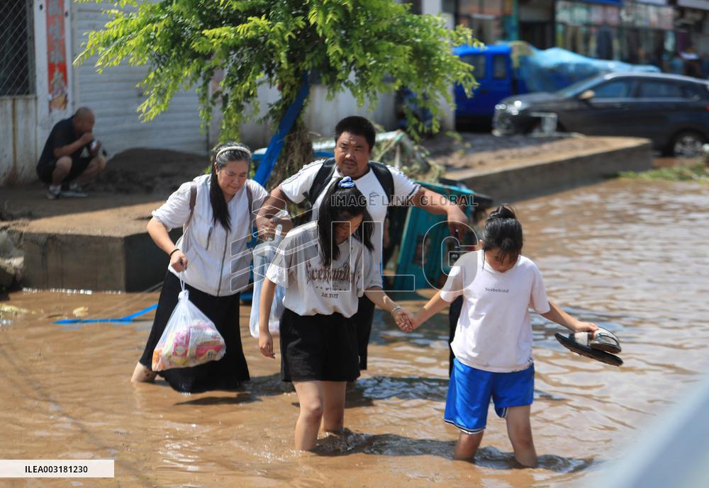 Disastrous Rainstorms Drench Provinces Across China