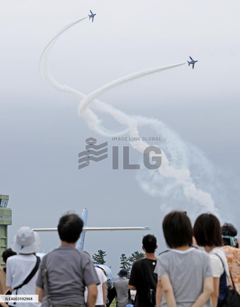 Blue Impulse aerobatic team flies over ASDF base in northeastern Japan
