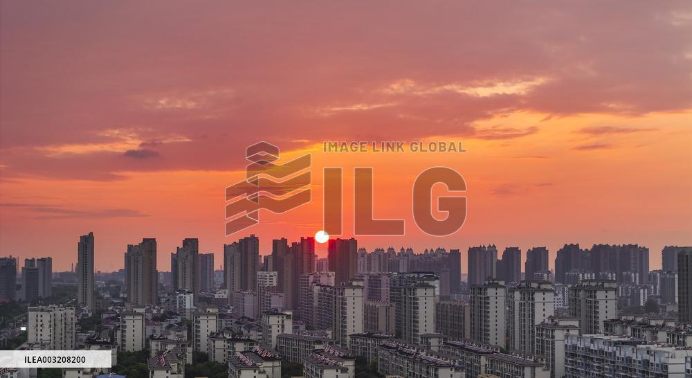 Urban Buildings Illuminated By The Setting Sun in Huai'an