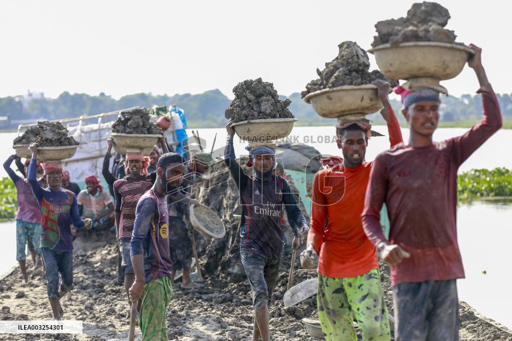 Workers Unload Earth From Meghna River - Dhaka
