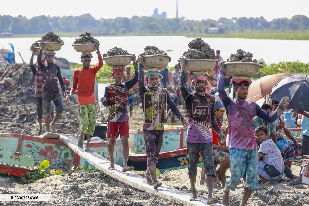 Workers Unload Earth From Meghna River - Dhaka