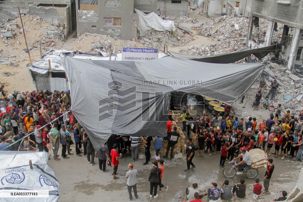 People Get Food Relief In Jabalia Refugee Camp - Gaza