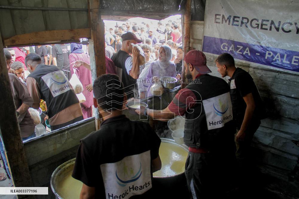 People Get Food Relief In Jabalia Refugee Camp - Gaza