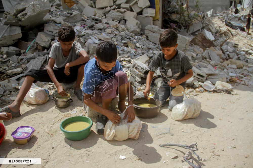 People Get Food Relief In Jabalia Refugee Camp - Gaza