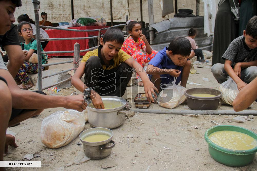 People Get Food Relief In Jabalia Refugee Camp - Gaza