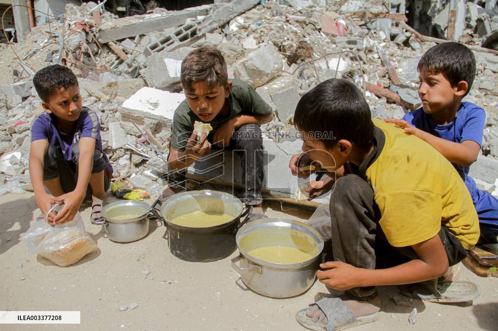 People Get Food Relief In Jabalia Refugee Camp - Gaza